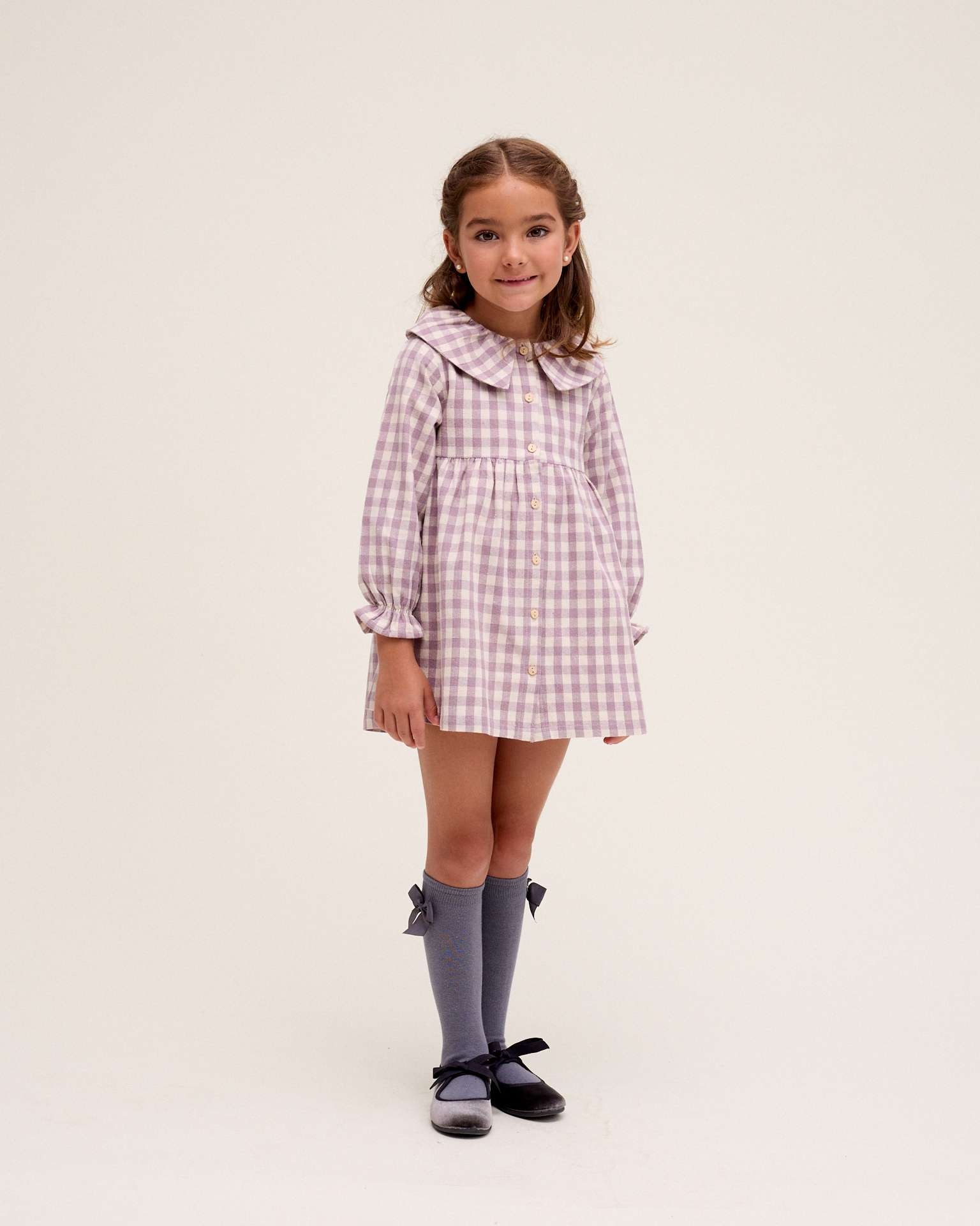Imagen 0 de Vestido de niña cuadros con volante en el cuello Rosa