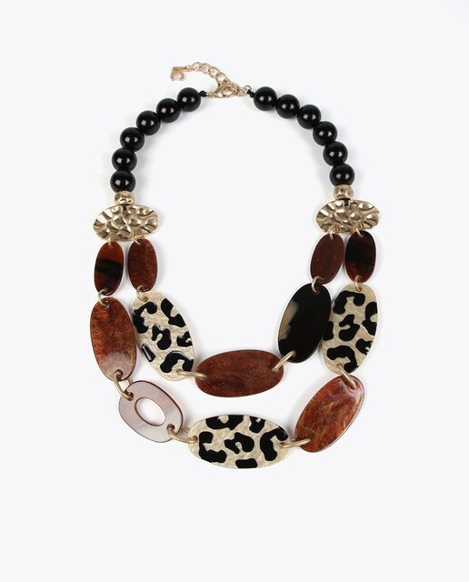 Imagen 0 de Collar con piezas y cierre ajustable