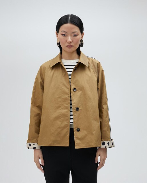 Imagen 0 de Chubasquero de mujer tipo trench con botones