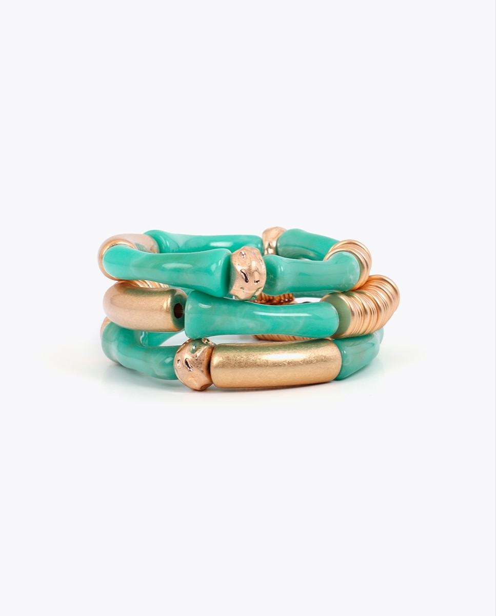 Imagen 0 de Pulsera con charms elásticas con piezas metálicas efecto bambú Turquesa