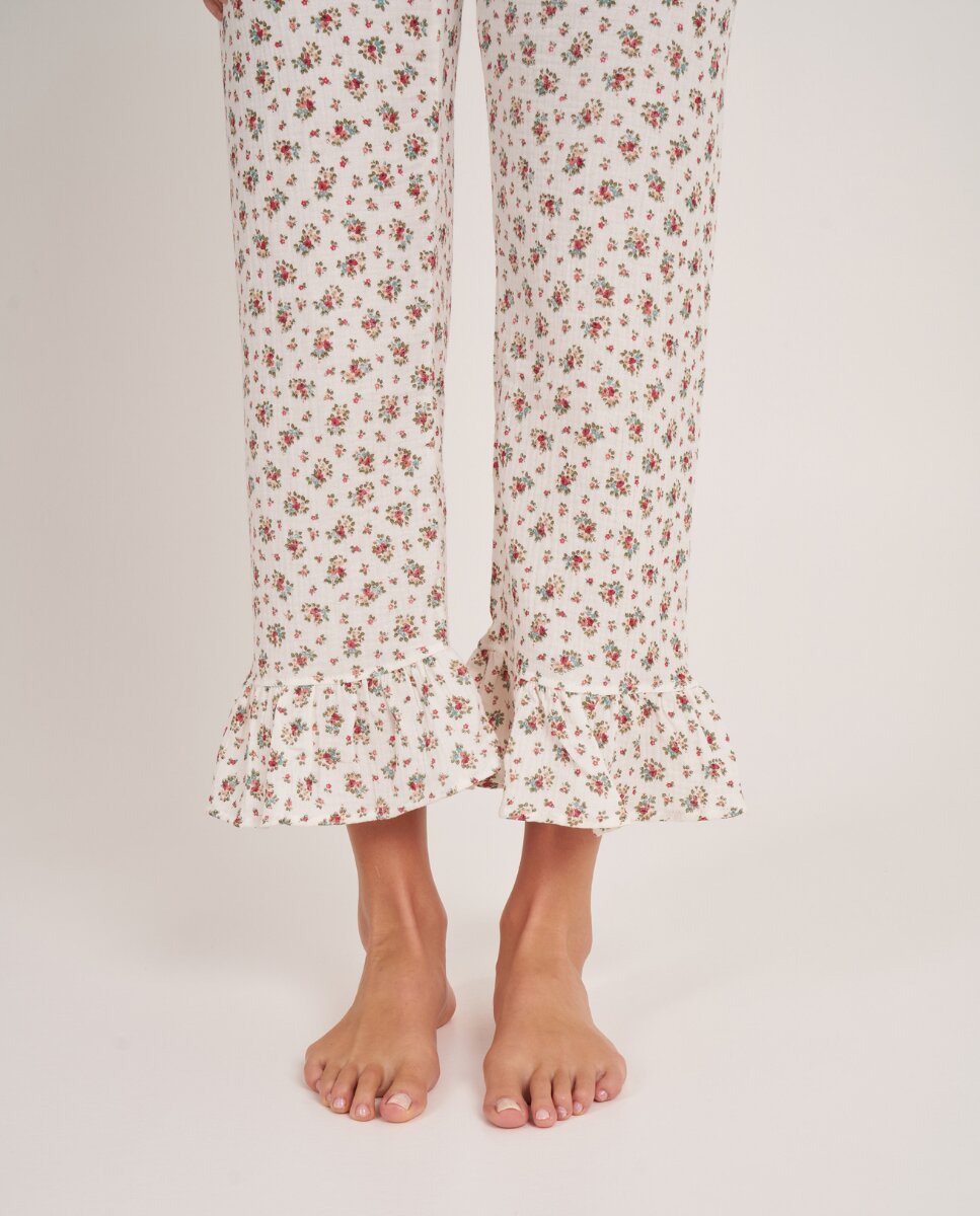Imagen 0 de Pantalón largo con volante con estampado floral Crudo