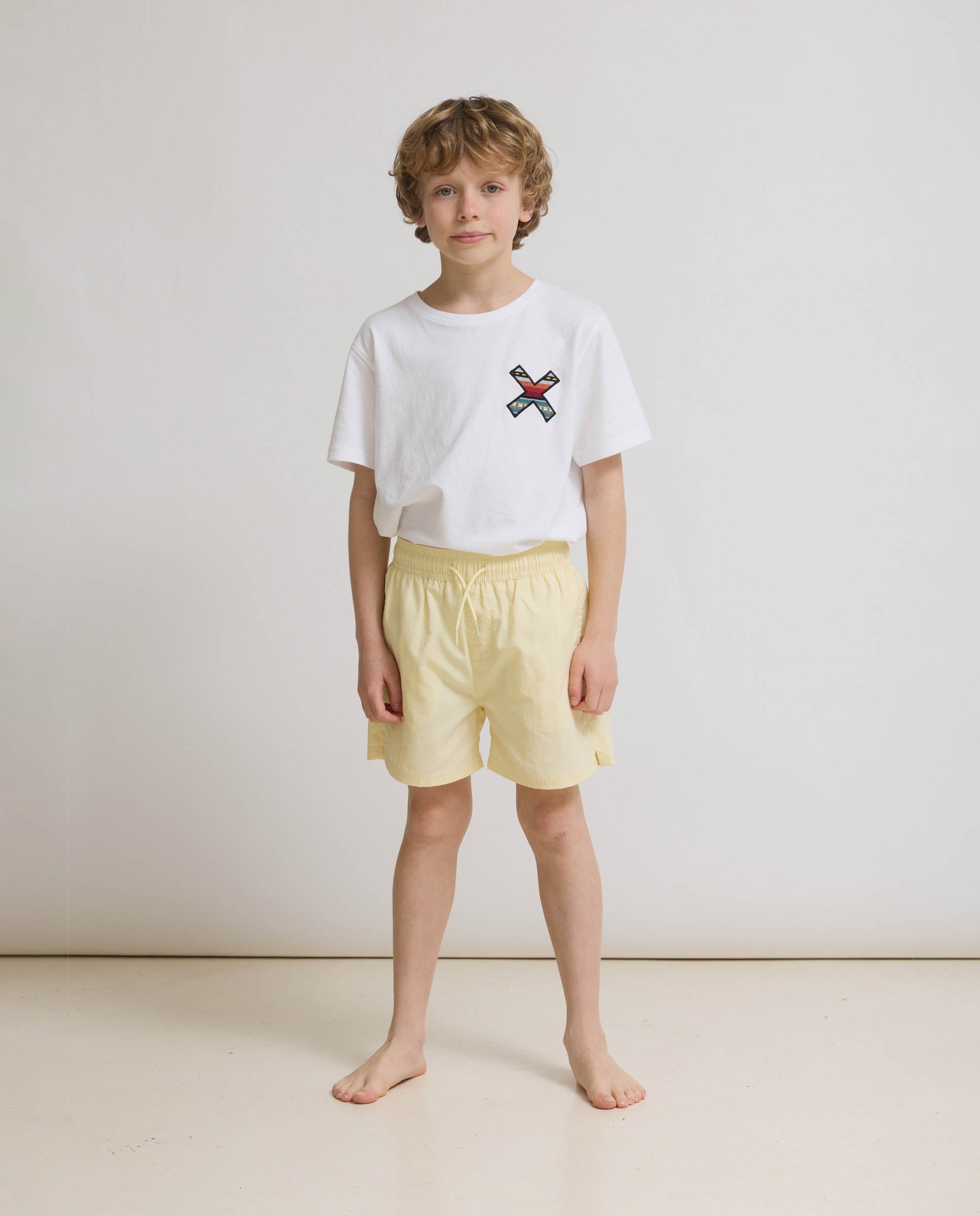 Bañador de niño core amarillo claro