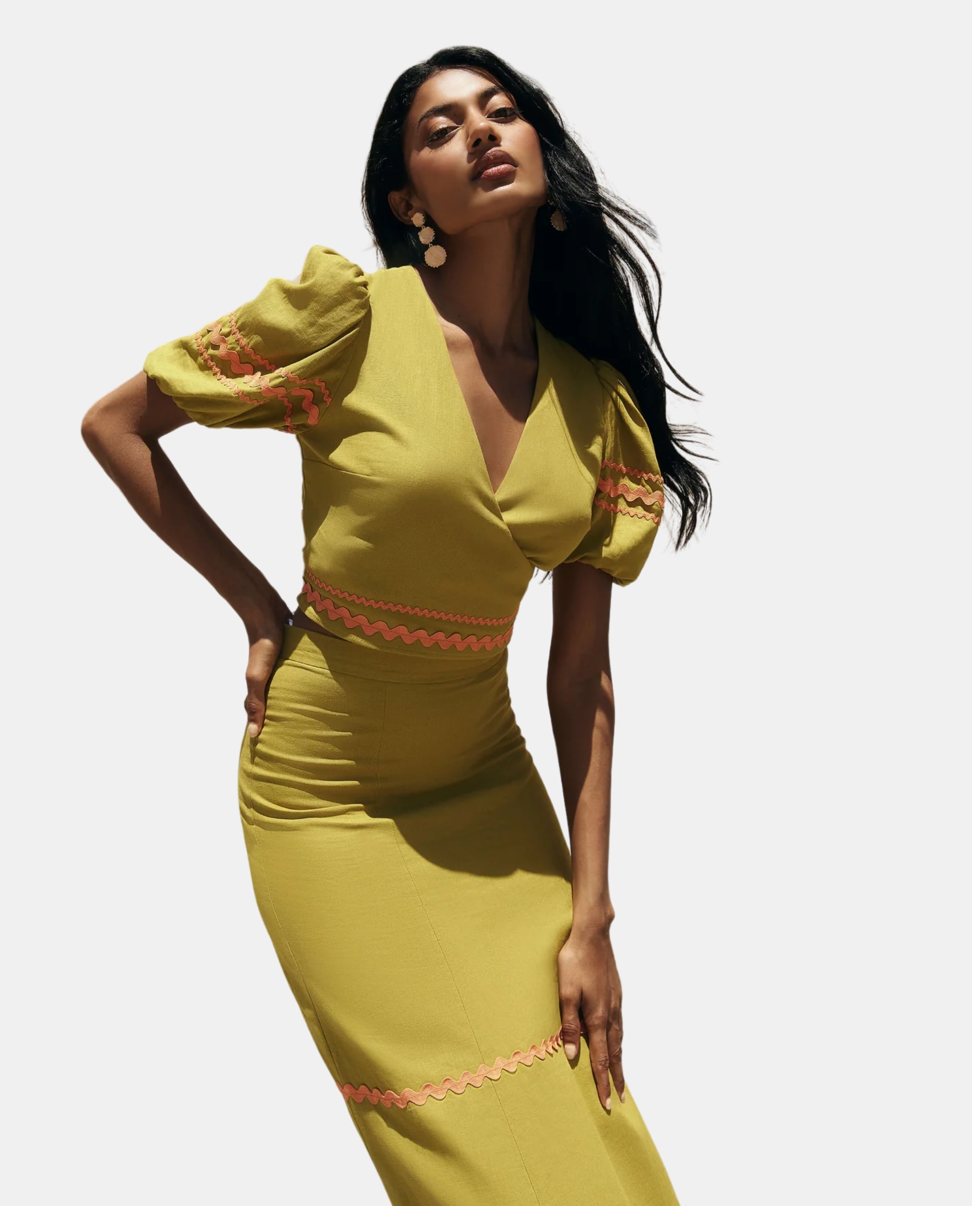 Imagen 0 de Top de mujer con escote en pico y mangas abullonadas