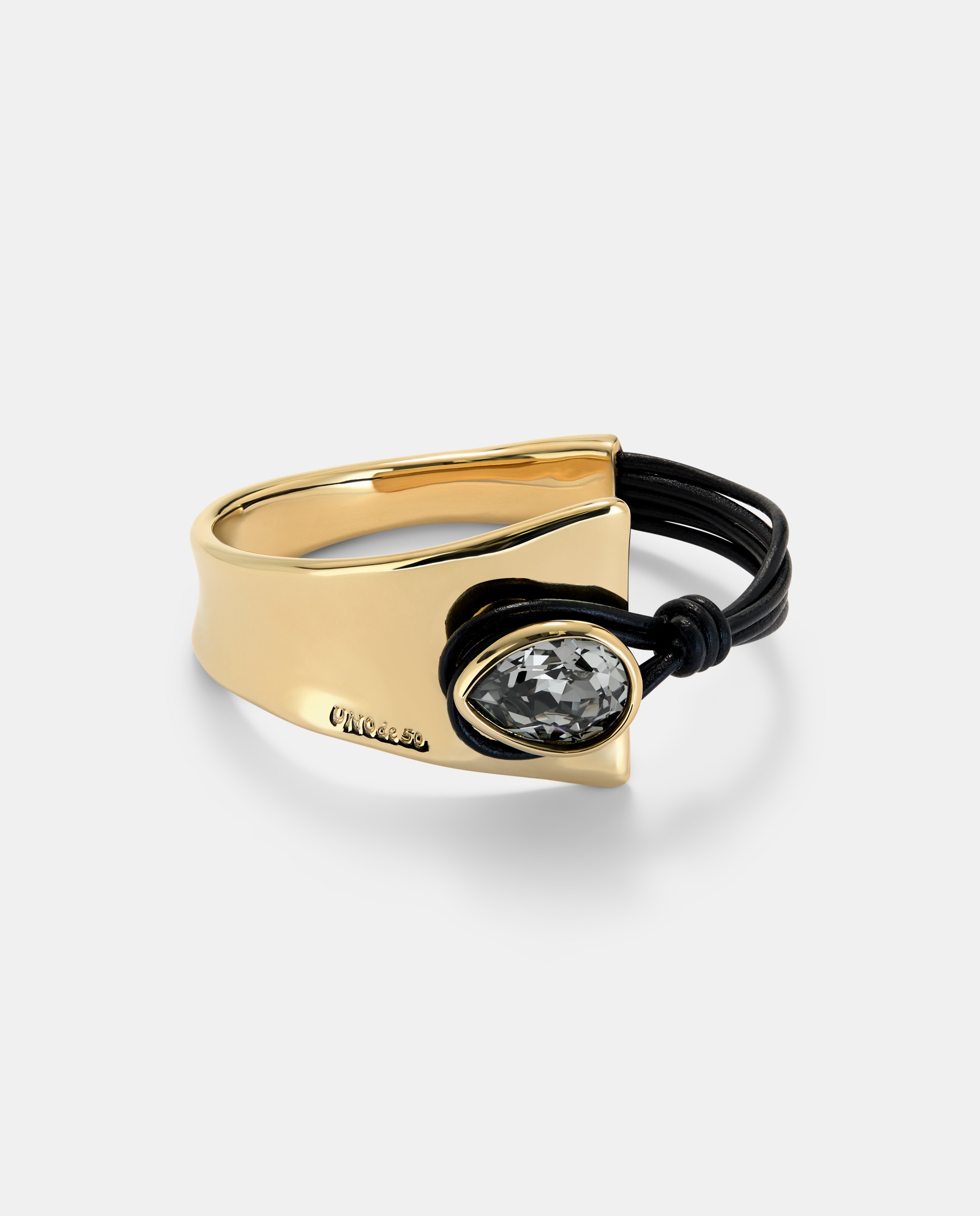 Imagen 1 de Pulsera semirígida con cuero y aleación de metales bañados y cristal facetado Gris