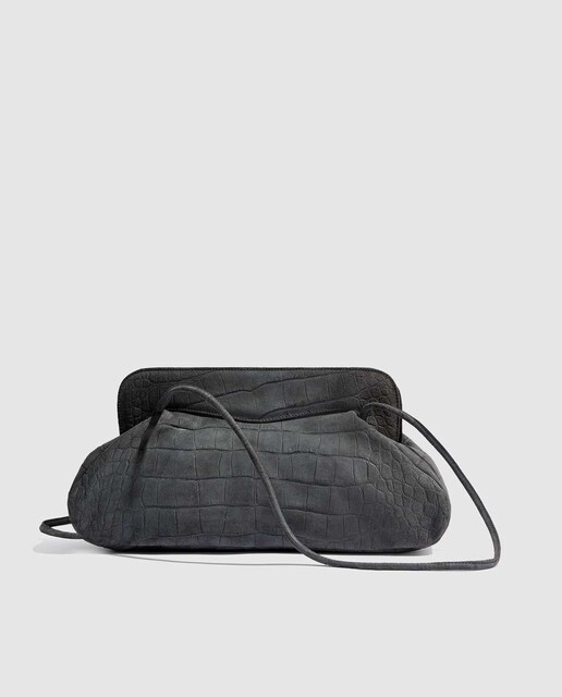 Imagen 0 de Bolso de hombro multiposición de piel de serraje gris con grabado en coco