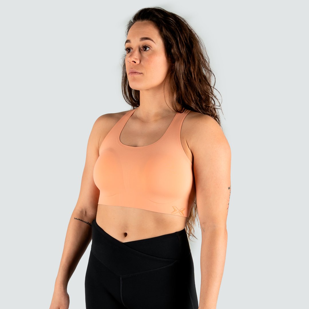 Imagen 0 de Top deportivo de mujer Comfort Colección Rise Picsil Naranja claro