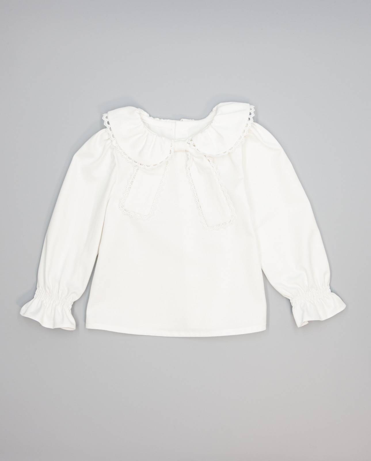 Imagen 0 de Camisa niña blanca con cuello fruncido y guipur Crudo