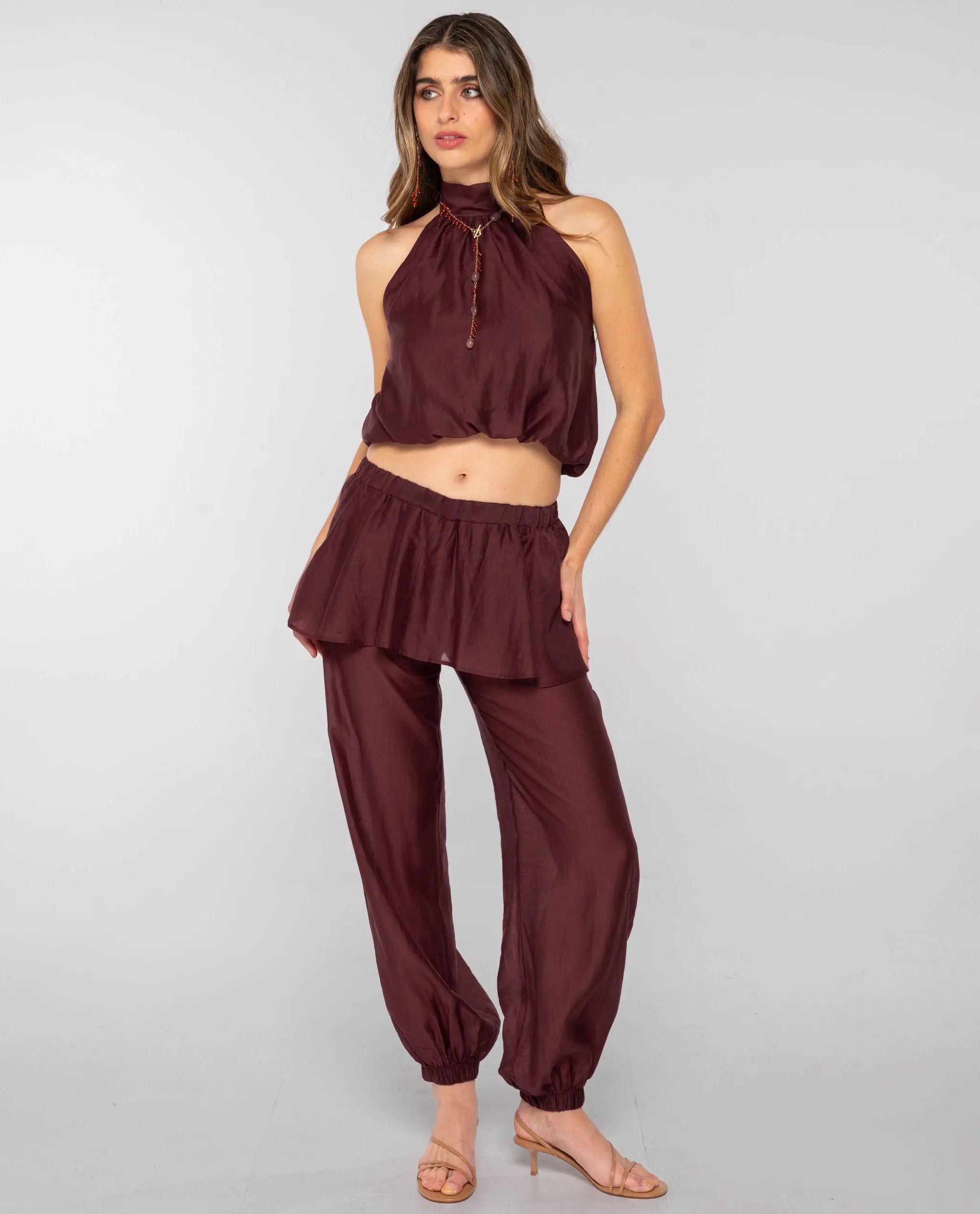 The-Are - Pantalón recto efecto bombacho de mujer con sobrefalda y cintura elástica.
