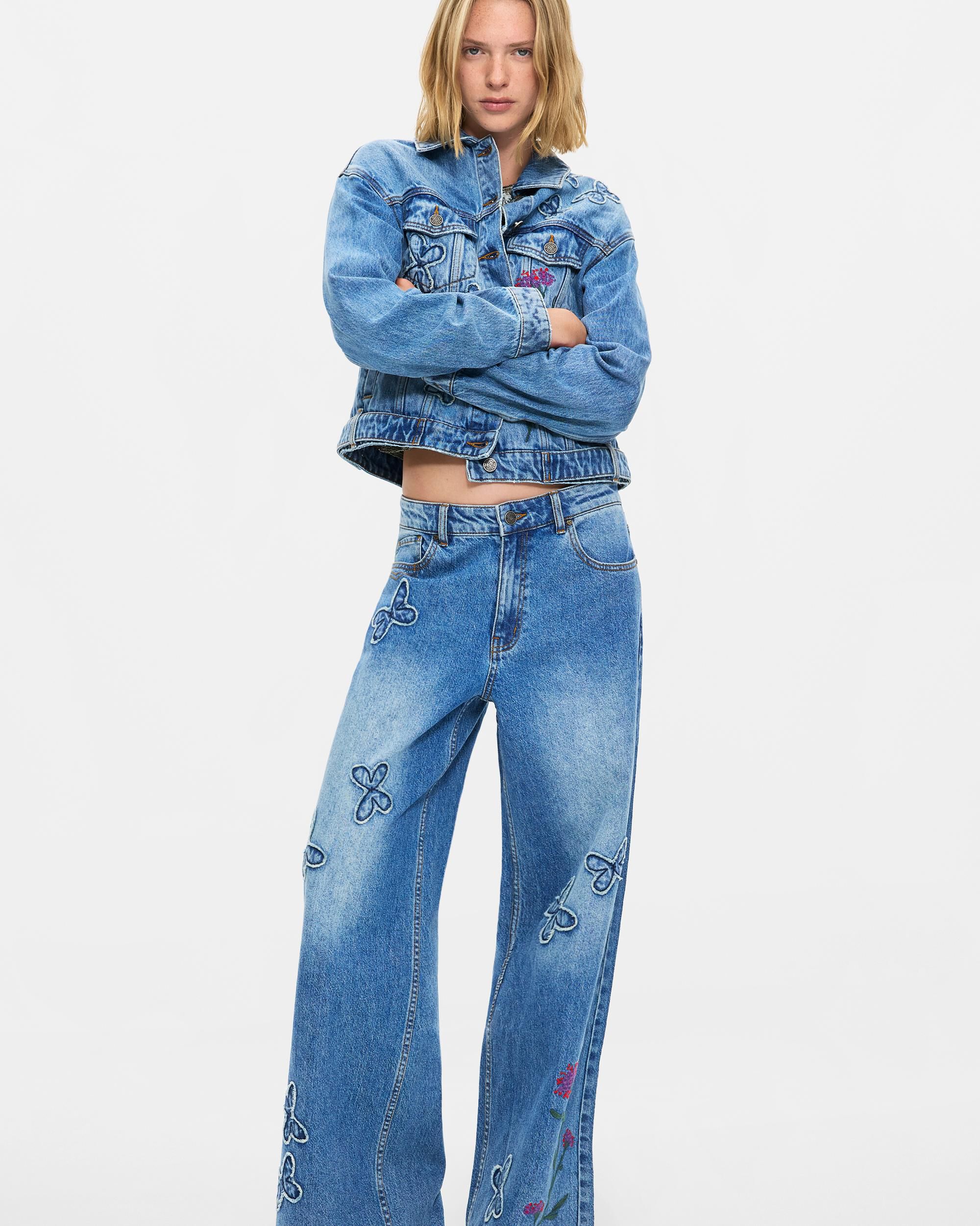 Desigual - Pantalón de mujer vaquero pierna ancha estampado.