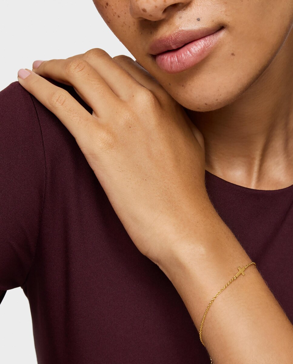 Pulsera Motivos cadena cruz con baño de oro 18 kt sobre plata