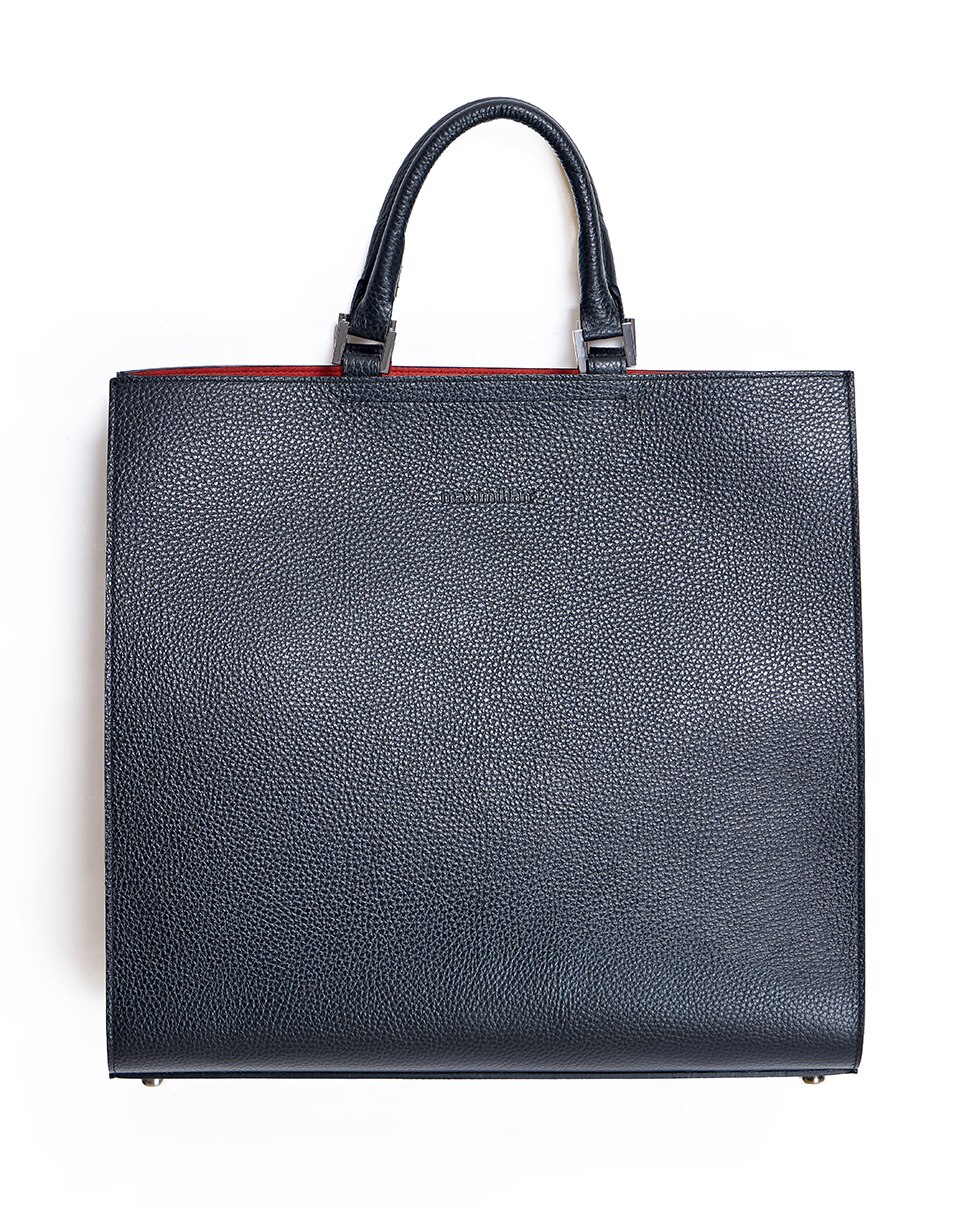 Imagen 0 de Bolso de mano de cuero con cierre magnético en color negro Negro