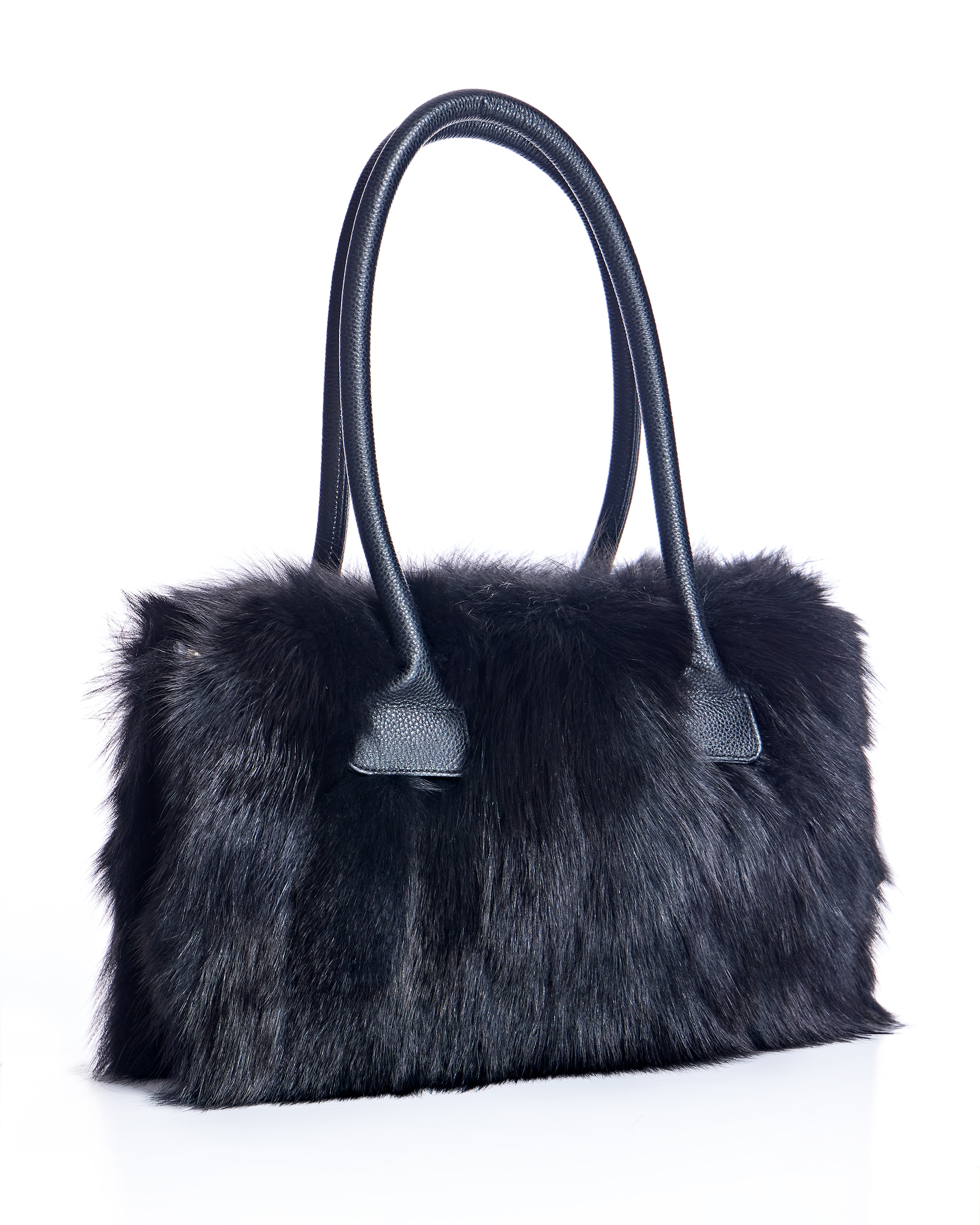 Imagen 0 de Bolso de mano de pelo de zorro con asa de cuero en color negro Negro