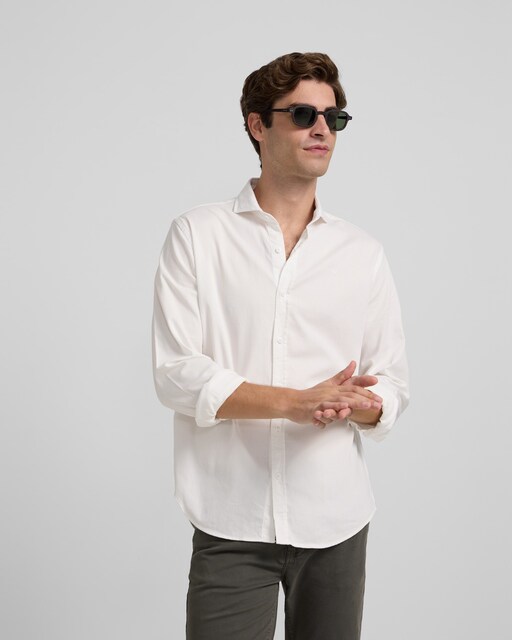 Imagen 0 de Camisa de hombre sport lisa micropique tono