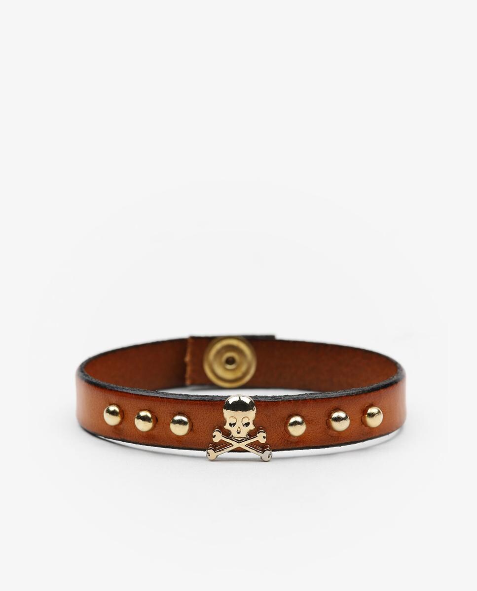 Pulsera de mujer de piel en marrón con calavera metálica y