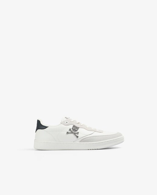 Imagen 0 de Zapatillas deportivas de hombre con detalle a contraste en talón y cordones moteados