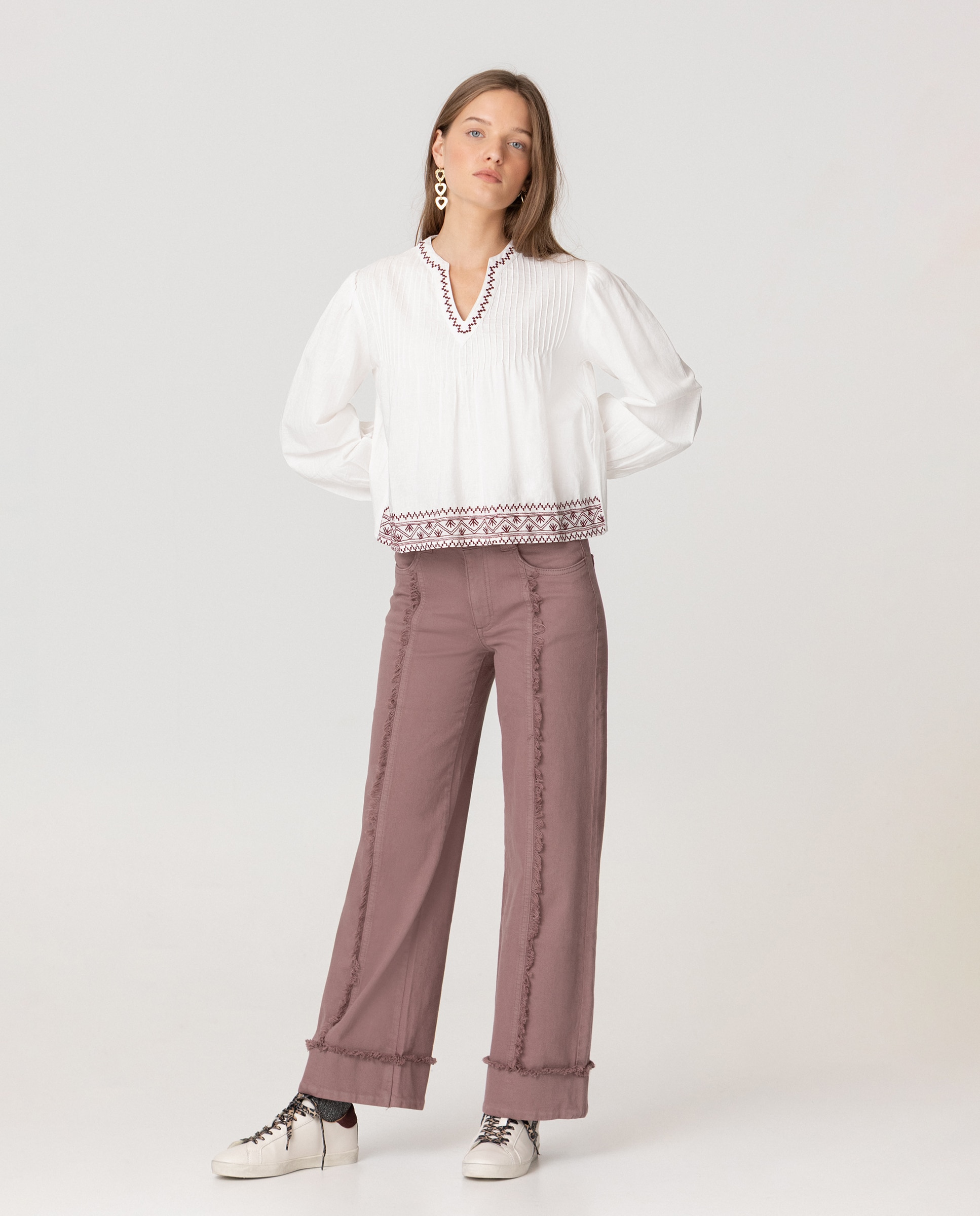 Noon - Vaqueros con costura desflecada de mujer.