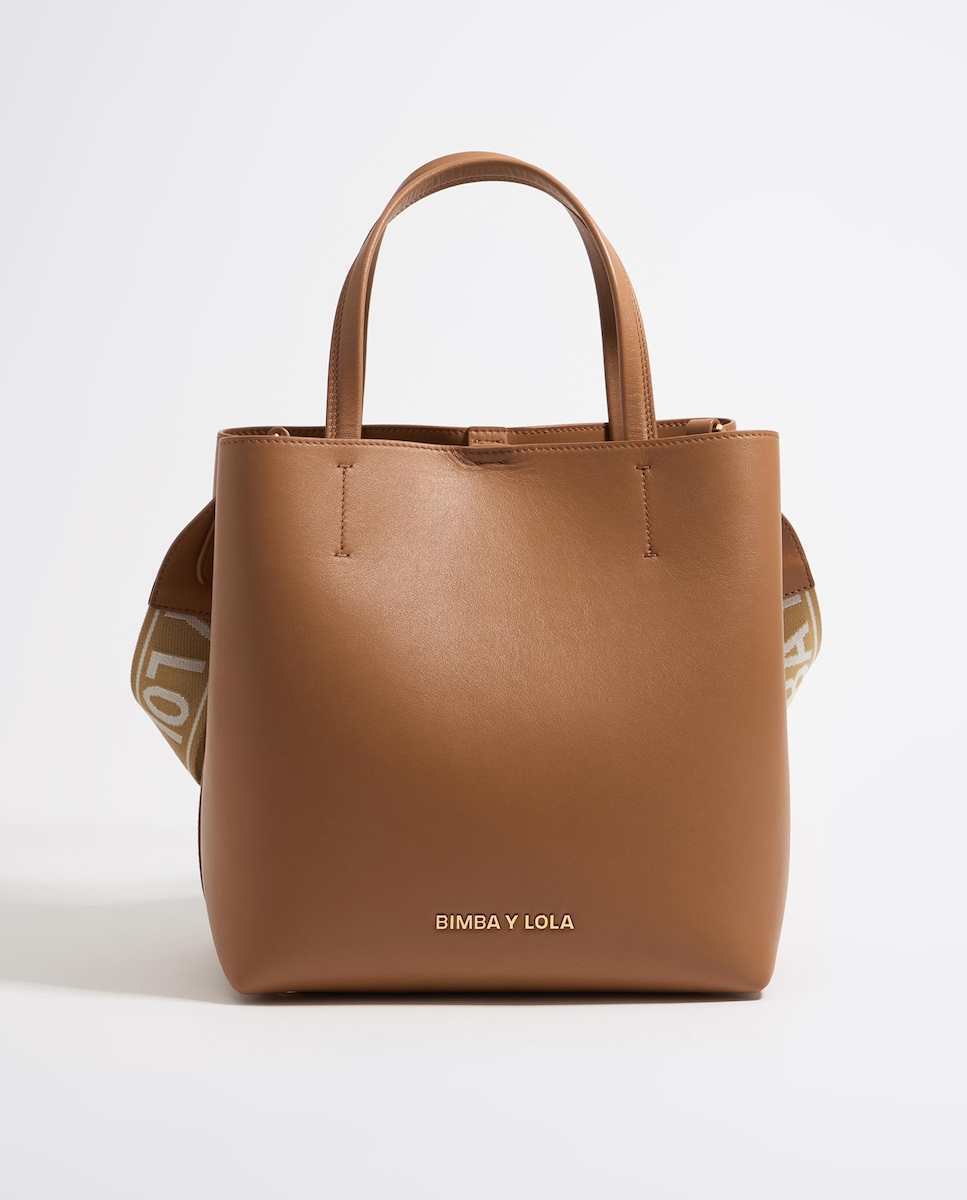 Bolso de mano de piel grande convertible a bandolera · Bimba y