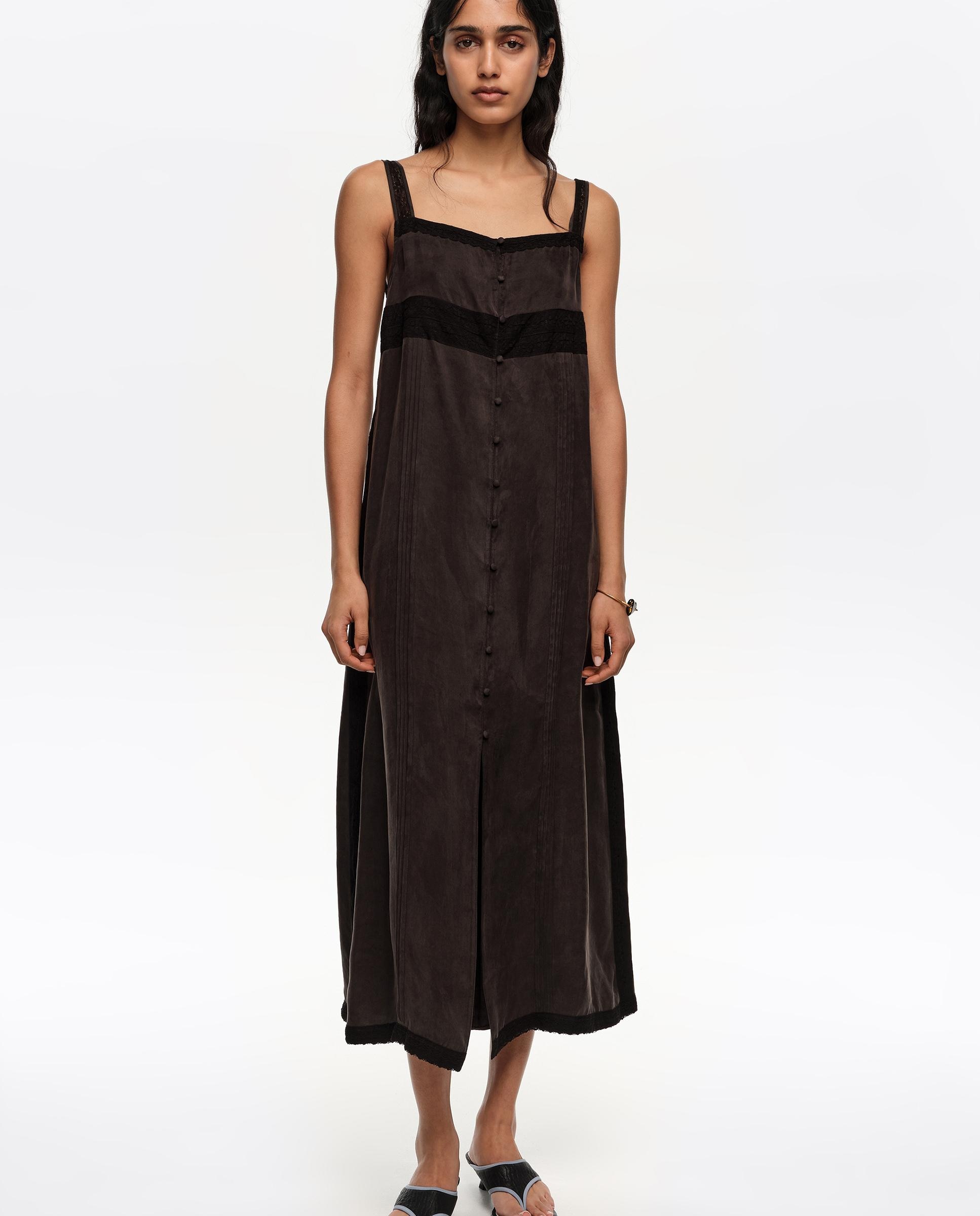 Bimba y Lola - Vestido línea A botones y encajes.