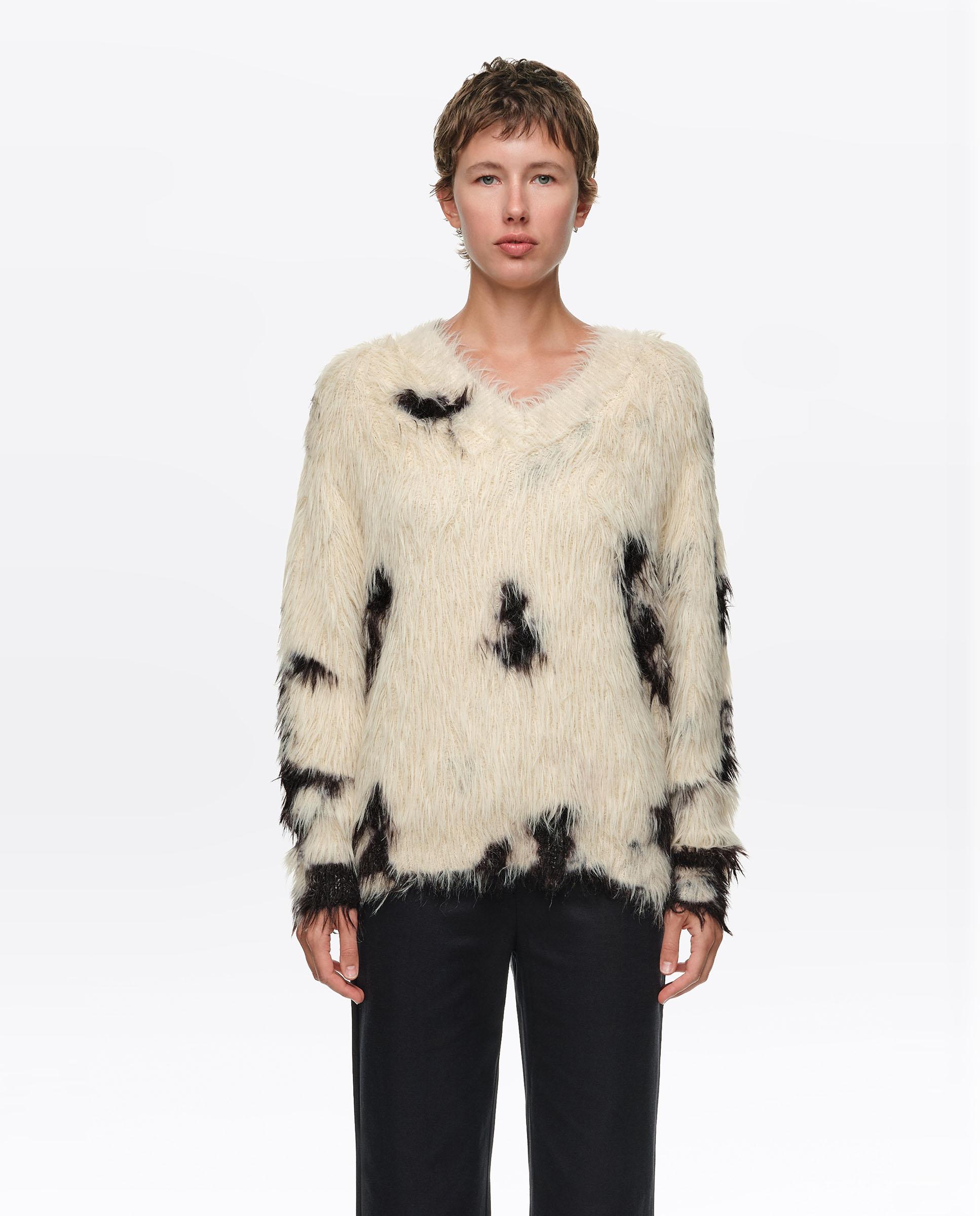 Imagen 0 de Jersey de mujer pelo escote v pony Beige
