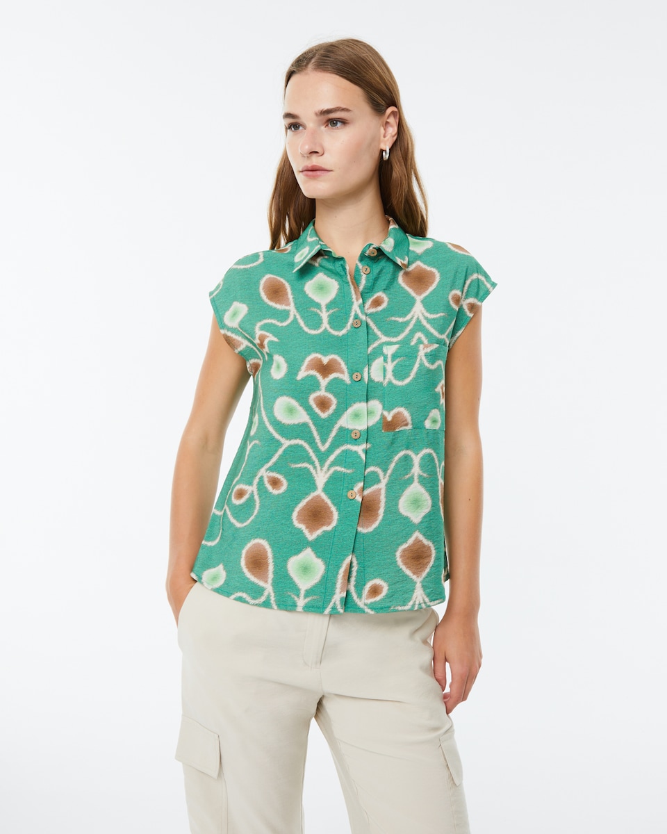 Camisa de mujer estampada y ancha de manga corta caída · Paz