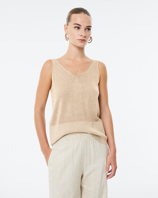Imagen 0 de Top de mujer brillante de punto tricot con escote de pico frontal y trasero