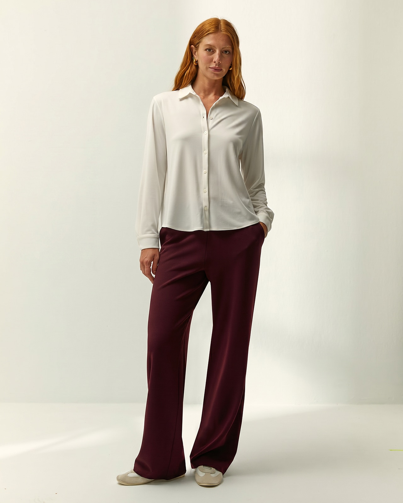 Imagen 0 de Pantalón recto de mujer punto liso cintura elástica Granate