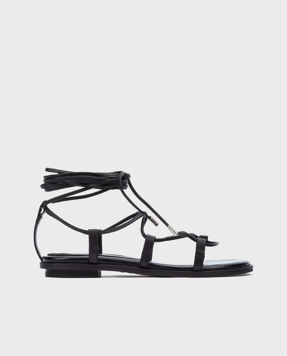 Martinelli - Sandalias planas de mujer de piel con tiras en textil en color negro.