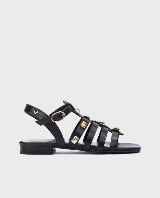 Imagen 0 de Sandalias de mujer de piel con cierre de hebilla en color negro