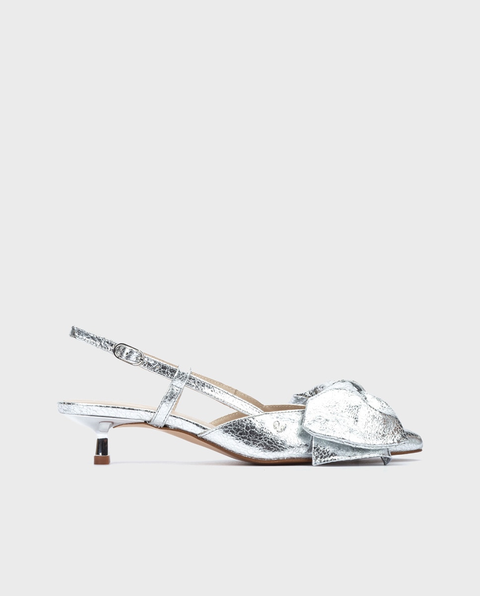 Martinelli - Zapatos de tacón de mujer de piel con cierre de hebilla y detalle de lazo en color plata.