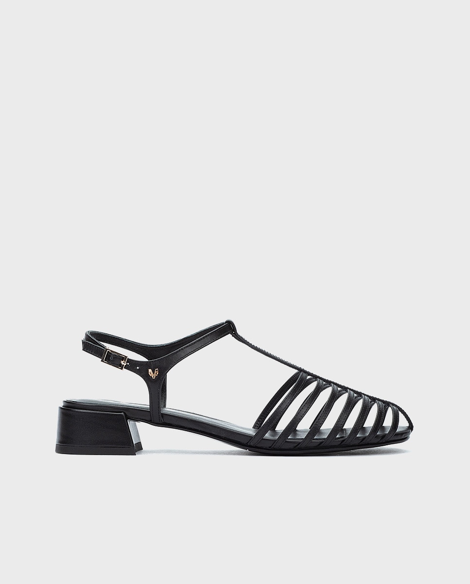 Martinelli - Sandalias planas de mujer de piel con cierre de hebilla en color negro.