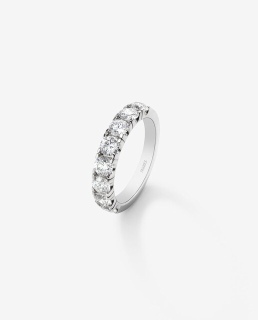 Imagen 0 de Media alianza de oro blanco de 18K con 11 diamantes en talla brillante con un total de 0,55 cts