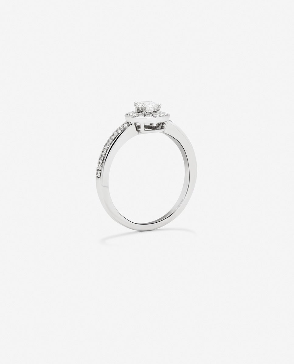 Anillo solitario de oro blanco de 18k con diamante central en talla brillante de 0,15 cts y orla y brazo con 30 diamantes en talla brillante con un total de 0,28 cts - SUAREZ - Blanco Blanco-5