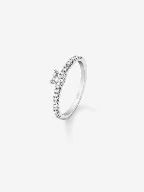 Imagen 0 de Anillo de compromiso de oro con diamante central y en brazos