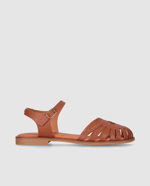 Imagen 0 de Sandalias en piel planas de mujer con tachas decorativas y puntera redonda
