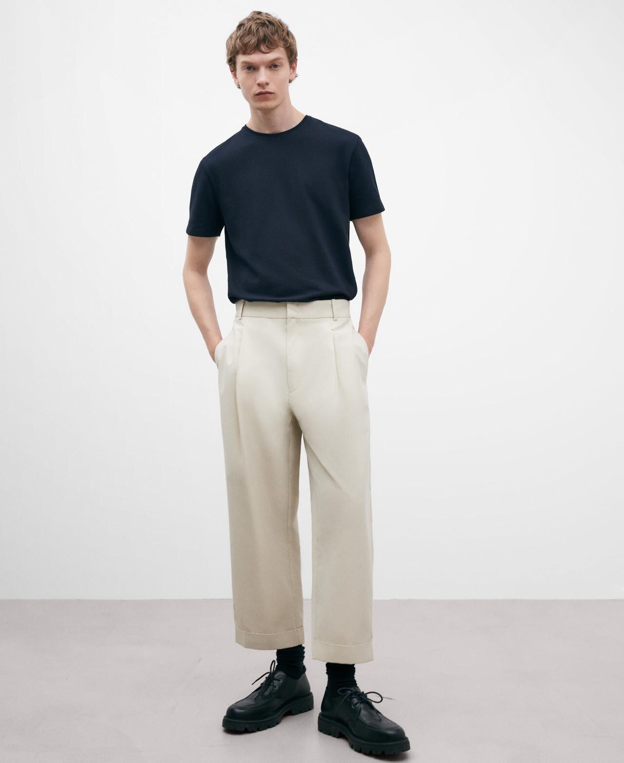 Pantalones de vestir de hombre con bolsillos laterales y estampado liso