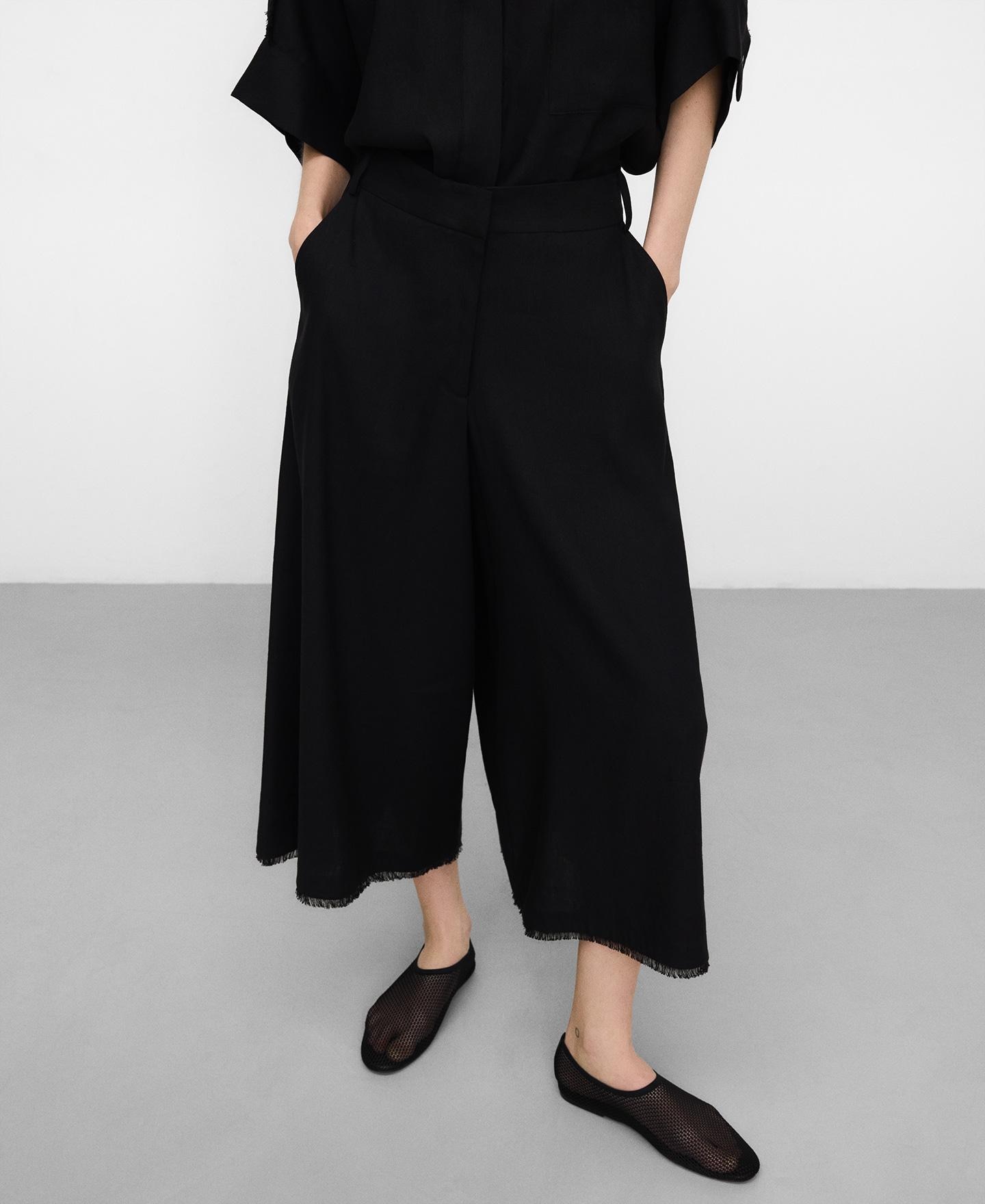 Adolfo Dominguez - Pantalones anchos de mujer culotte desflecado.
