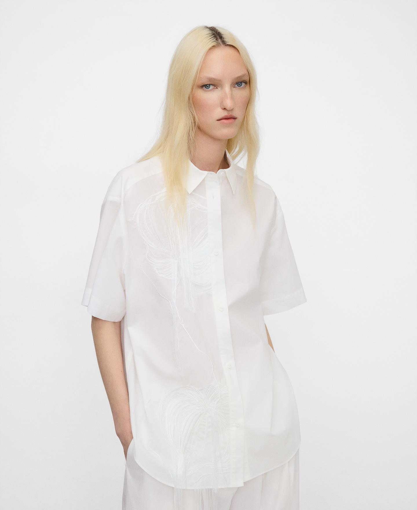 Adolfo Dominguez - Camisa de mujer oversize bordada en algodón orgánico.