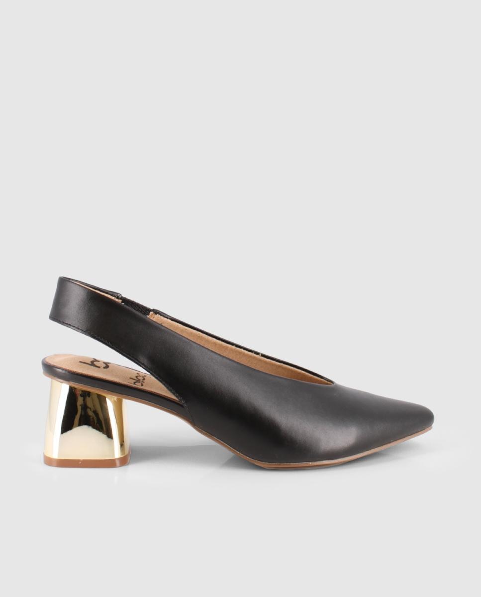 Blogger - Zapato de salón de mujer con puntera afilada y destalonado.