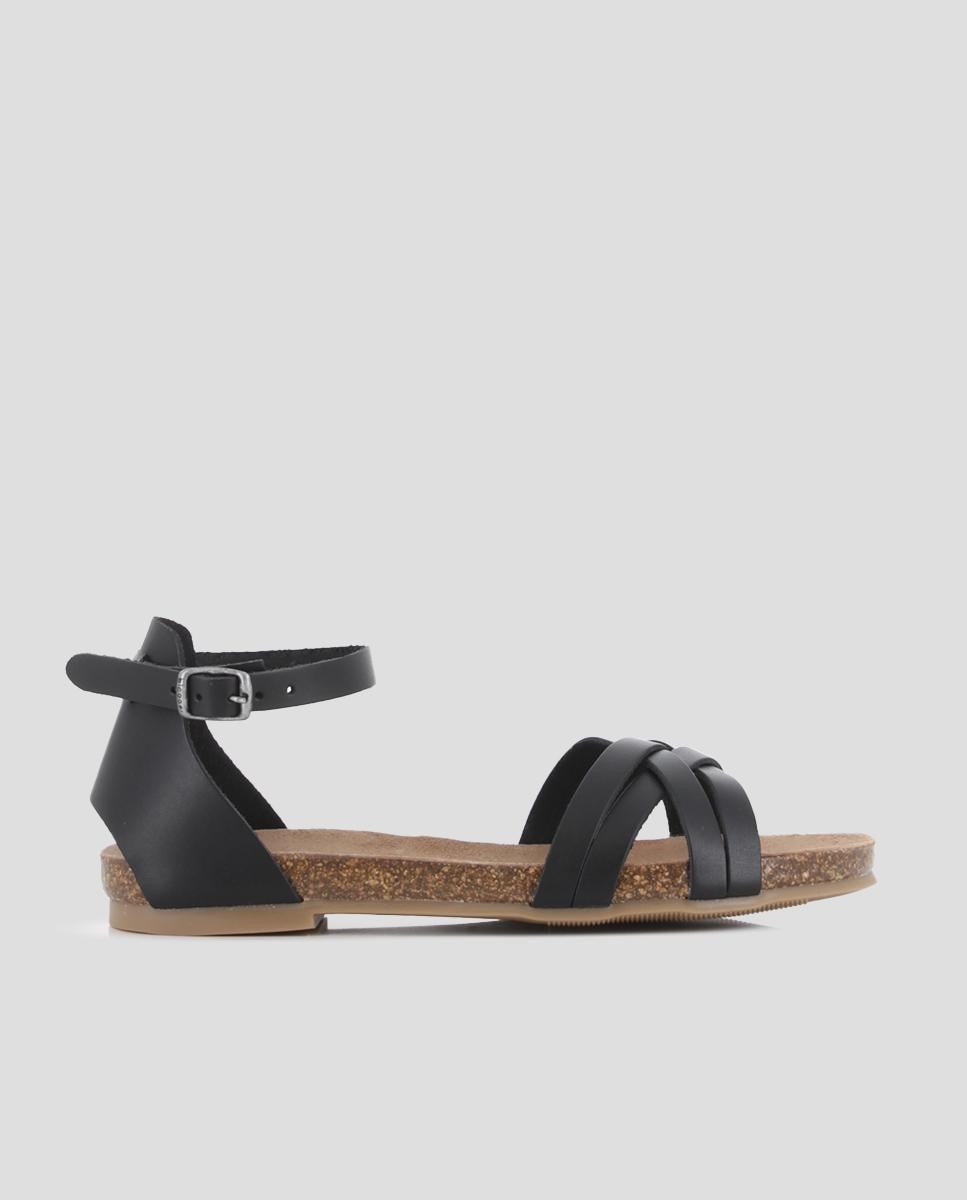 Blogger - Sandalias planas de mujer de piel con pulsera en el tobillo.