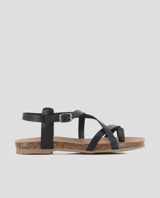 Imagen 0 de Sandalias planas de mujer de piel con tiras entrelazadas