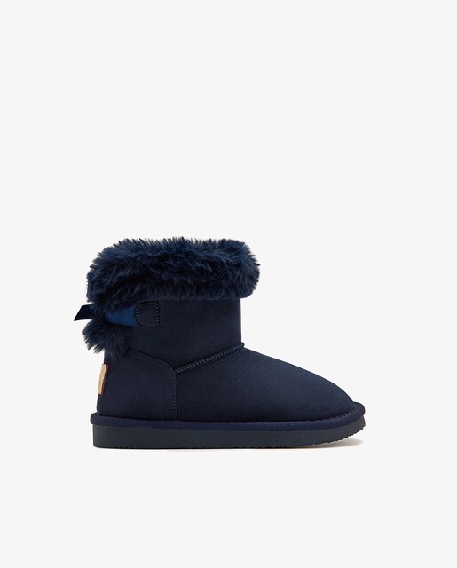 Imagen 0 de Botas de niña estilo australianas con cinturón de pelo y lazo