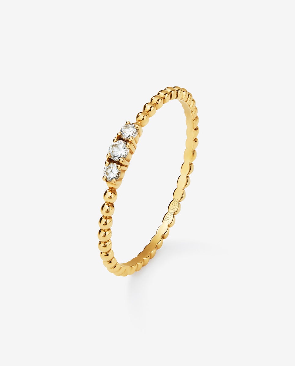 Imagen 0 de Anillo tresillo de oro amarillo de 18K con 3 diamantes con un total 0,08 cts Blanco