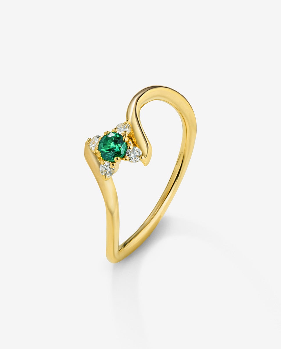 Imagen 0 de Anillo de oro amarillo de 18k con esmeralda verde en talla brillante de 0,088 cts y 4 diamantes en talla brillante con un total de 0,08 cts Blanco / Verde