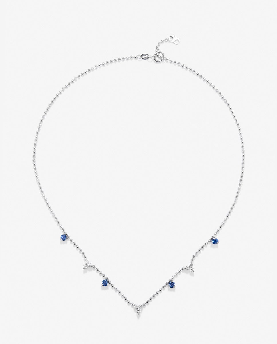Imagen 1 de Colgante de oro blanco de 18k con 4 zafiros azules en talla brillante con un total de 0,85 cts y 9 diamantes en talla brillante con un total de 0,54 cts - SUAREZ - Azul Azul