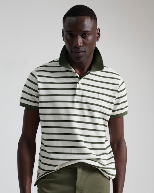 Imagen 0 de Polo rayas cuello contraste de hombre slim fit