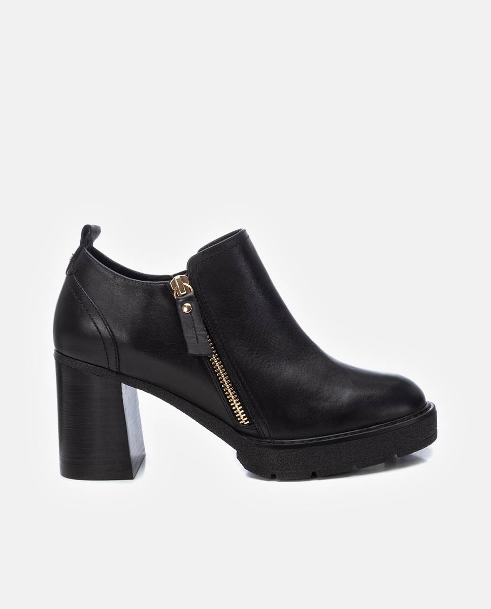 Imagen 0 de Botines de mujer de piel con tacón alto y cremallera Negro