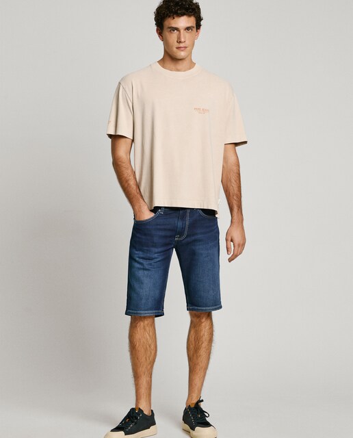 Bermuda vaquera de hombre fit slim con efecto desgastado