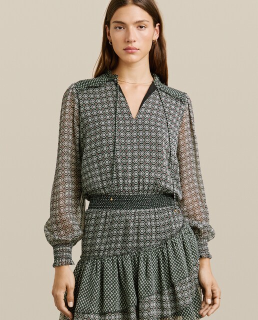 Imagen 0 de Vestido corto con falda asimétrica y estampado geométrico