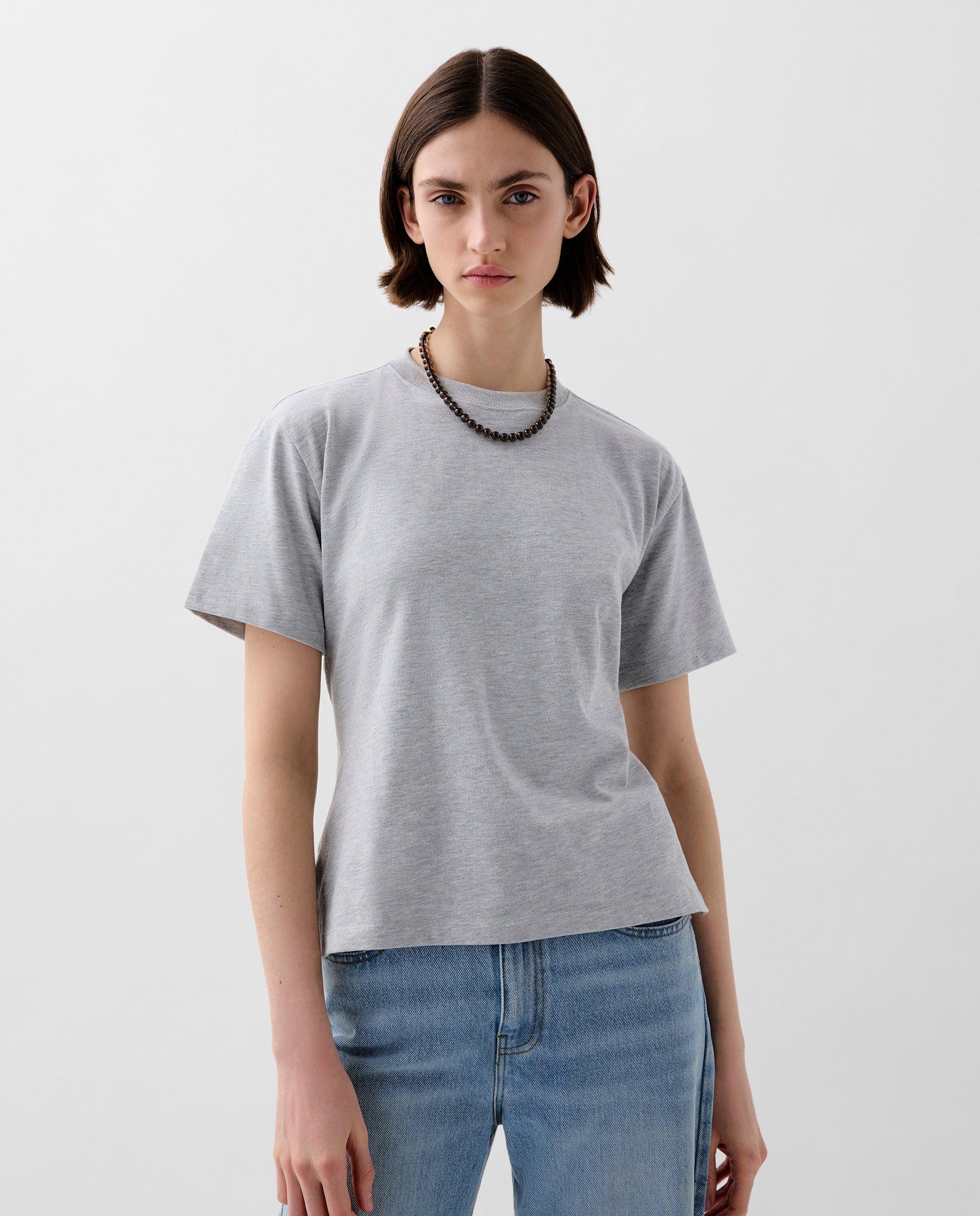 Scalpers - Camiseta de mujer de algodón con detalle de aberturas traseras.