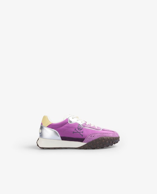 Imagen 0 de Zapatillas deportivas de mujer con acabados a contraste y calavera